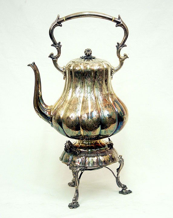 Silver plated swing kettle on stand, melon finial: Silver plated swing kettle on stand, melon finial on hinged lid, engraved paneled decoration, on stand with three pad feet, William Hutton & Sons maker's mark, 1864-1900, 19" high