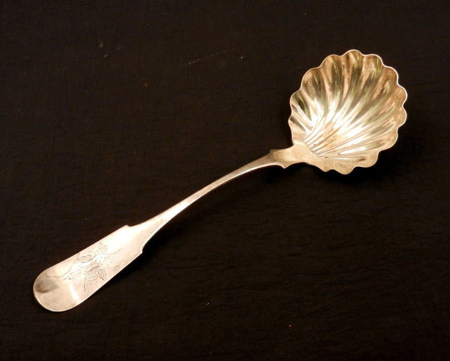 Coin silver clamshell serving spoon, engraved desi: Coin silver clamshell serving spoon, engraved design on front of handle, monogrammed on back, 10 1/2", J. Lewis maker, 19th C.