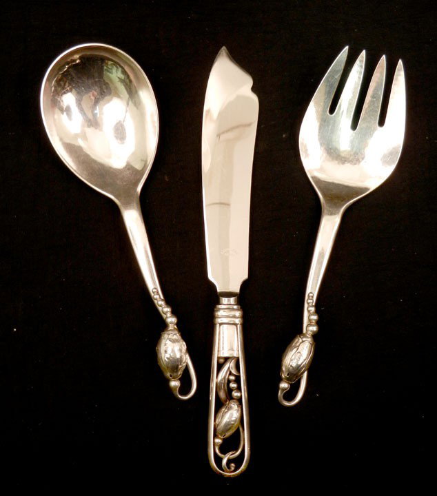 Three Georg Jensen sterling silver serving pieces : Three Georg Jensen sterling silver serving pieces "Blossom" including 8 1/2" salad serving fork and spoon, and a 10 1/4" fish knife, 6.525 troy oz (fork and spoon only)