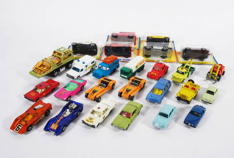 1958-1979 Matchbox Vehicles Grouping: Circa 1958-1979 Matchbox vehicles twenty-six piece grouping, 1958 Wolseley 1500, 1959 Jaguar 3.4. Litre, 1961 Ford Anglia, 1965-1969 Dodge Wreck Truck, 1966 Ford Galaxie Fire Chief car and Police car