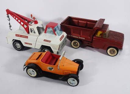 1960's Nylint and Structo Vehicles Grouping: Circa 1960's Nylint Corporation and Structo pressed metal vehicles three piece grouping, Nylint A-1 Towing Dual Boom Tow Truck and Model T Roadster Hot Rod and Structo Hydraulic Dumper Dump Truck