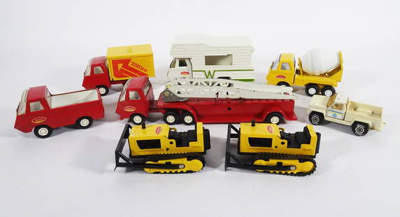 1970's Tiny Tonka Vehicles Grouping: Circa 1970's Tonka Toys Tiny Tonka pressed metal vehicles seven piece grouping, #495 Bulldozer (qty 2), #515 Pick-Up Truck, #575 Cement Mixer, #675 Aerial Ladder Fire Truck, #800 Minnie Winnie, Bell