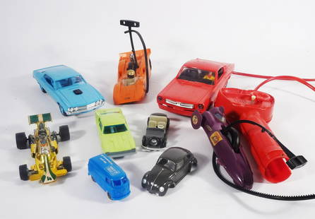 1960's-1980's Plastic Toy Vehicles Grouping: Circa 1960's-1980's plastic toy vehicles eight piece grouping, 1960's Cragstan Industries Ford Mustang with battery operated steering control, 1960's German Volkswagen, 1970 Kenner Products SSP Can-Am