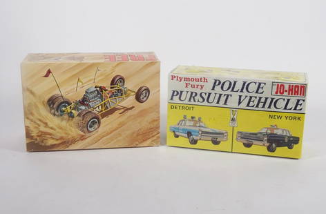 1960's AMT and Jo-Han 1/25 Scale Model Kits: Circa 1960's AMT Corporation and Jo-Han Models Inc. 1/25 scale model kits two piece grouping with original boxes, AMT Sandkat Dragster and Jo-Han Models Inc. GC-1300:200 Plymouth Fury Police Pursuit