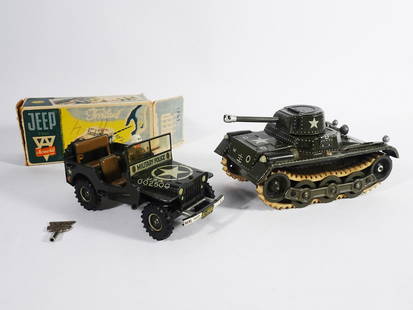 1950's German Wind-Up Miltary Toys: Circa 1950's German tin wind-up military toys two piece grouping, Arnold Toy Co. U.S. Zone Germany No. 2500 Military Police Jeep with its original box and key and D.R.G.M. West Germany Gama Tank