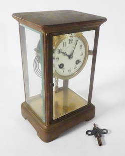 French Regulator Mantle Clock: French Regulator mantle clock, brass cased with glass panels, Japy Freres French movement, enameled porcelain dial with Arabic numerals, time and strike movement, clock face is signed Blair and