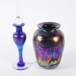 Purple Iridescent Studio Art Glass Grouping: Two piece purple iridescent studio art glass grouping, Arthur Allison vase with an oil spot style design, signed on underside of base A. Allison 5837, and Robert Held perfume bottle with a swirl desig