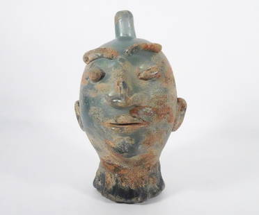 Contemporary Art Glass Face Sculpture: Contemporary art glass grotesque mask bottle sculpture, iridescent green glass with an applied finish to the glass, illegible artisan signature on underside of base, circa late 20th c., 10" (h) x 6"