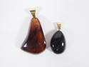 Two Amber Pendants