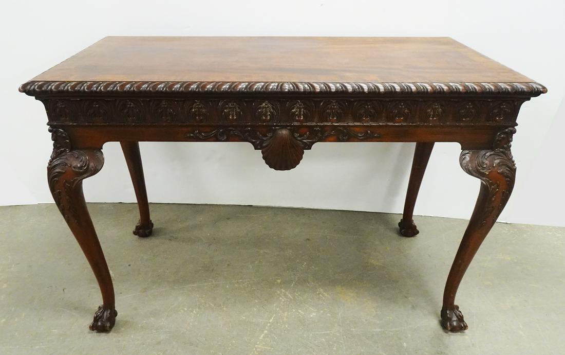 Chippendale Banded Mahogany Library Table: Chippendale banded mahogany library table, shell and scroll carvings, cabriole legs with ball and claw feet, circa mid 20th c., 33 1/2" (h) x 50" x 25 1/2"