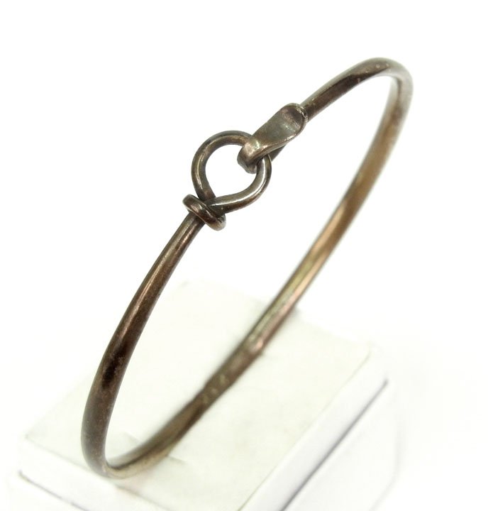 Georg Jensen sterling silver Torun bangle bracelet: Georg Jensen sterling silver Torun bangle bracelet, 7" inside circumference, 1/8" wide, marked Georg Jensen Denmark 925S Torun 212, weight 10.4 grams, mid 20th C.