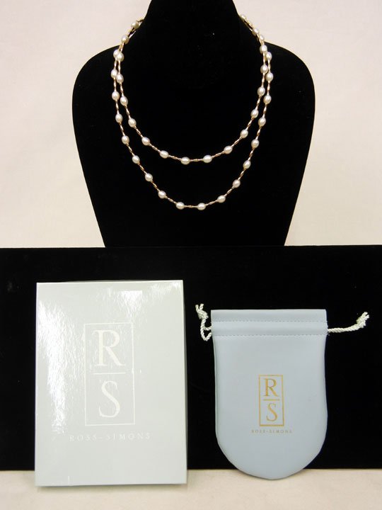Ross-Simons 14k gold and freshwater pearl necklace: Ross-Simons 14k gold and freshwater pearl necklace, oval freshwater pearls measuring 7mm long x 6mm wide alternating with gold bars, 36" long, marked 14k, weight 23.8 grams/15.3 dwt, original box and 