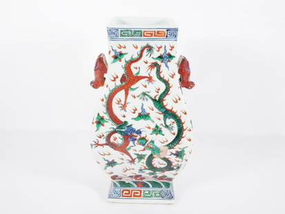 Chinese Export Porcelain Vase: Chinese Export porcelain vase, decorated with hand painted dragons, flames & floral motifs, Greek key style border along top and base rim, circa 19th c. Qing Dynasty period to early 20th c. Chinese Re