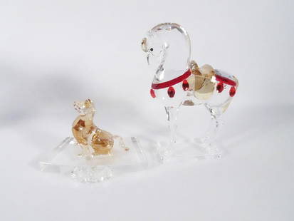 Swarovski Austrian Crystal Horse and Dog: Swarovski Austrian crystal horse and dog figures, circa 2013 to present Asian Icons series Warrior Horse and circa 2009 to present Zodiac Animal series Gold Dog, both are signed with the Swarovski swa