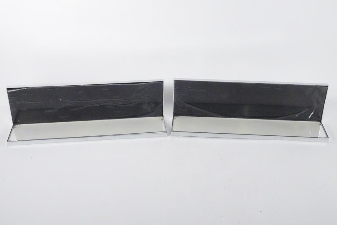 Pair of Philippe Starck Designed Wall Lights: Pair of Philippe Starck designed wall lights, Hide S-L UL LED model, early 21st c., both come with their original cloth bag holder, 4 1/2" (h) x 16 " x 4"