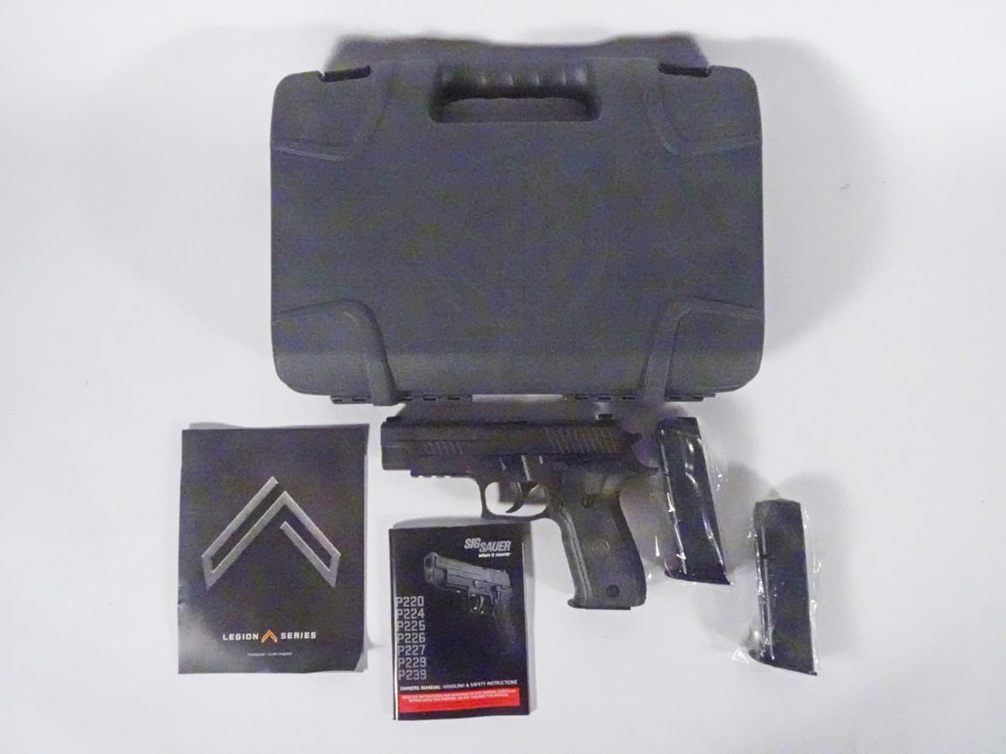 Sig Sauer P226 semi-automatic pistol: Sig Sauer model P226 semi-automatic pistol. 9mm, 10+1 round, magazine fed, serial number 47E021861. 4.4" barrel, overall length 7 3/4". Includes 3 magazines, factory plastic case and factory literatur