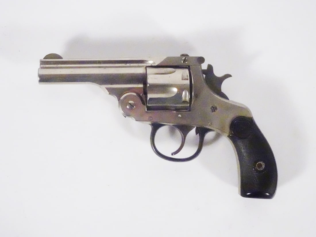 Harrington & Richardson double action revolver: Harrington & Richardson top-break, double action revolver. 32 caliber, 6 shot, cylinder. Serial number G83462. Serial number dates to 1946 per thefirearmsforum.com. Cylinder and frame serial numbers m