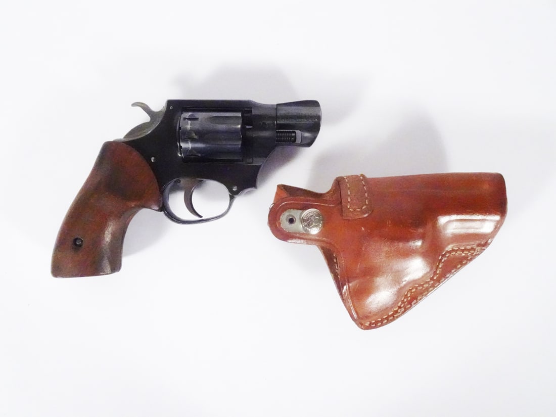 High Standard Sentinel MK IV double action revolver: High Standard Sentinel MK IV model double action revolver. 22 magnum, 9 round cylinder. Serial number S5508. 2" barrel, overall length 7". Includes Bianchi brown leather holster. C&R - NO / Instacheck