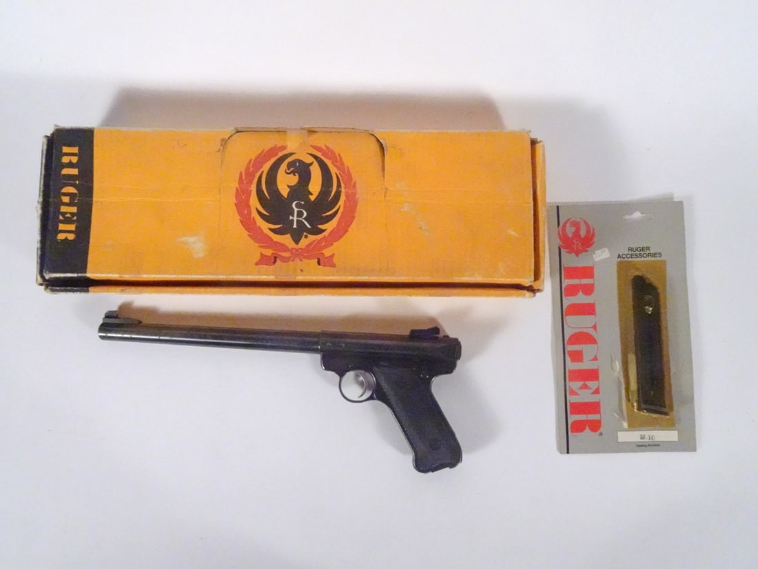 Ruger Mark II Target semi-automatic pistol: Ruger Mark II Target semi-automatic pistol. 22 long rifle, 10 rounds, magazine fed. Serial number 211-04536. 10" barrel, overall length 14". Includes 2X 10 round magazines (1 in original packaging) an