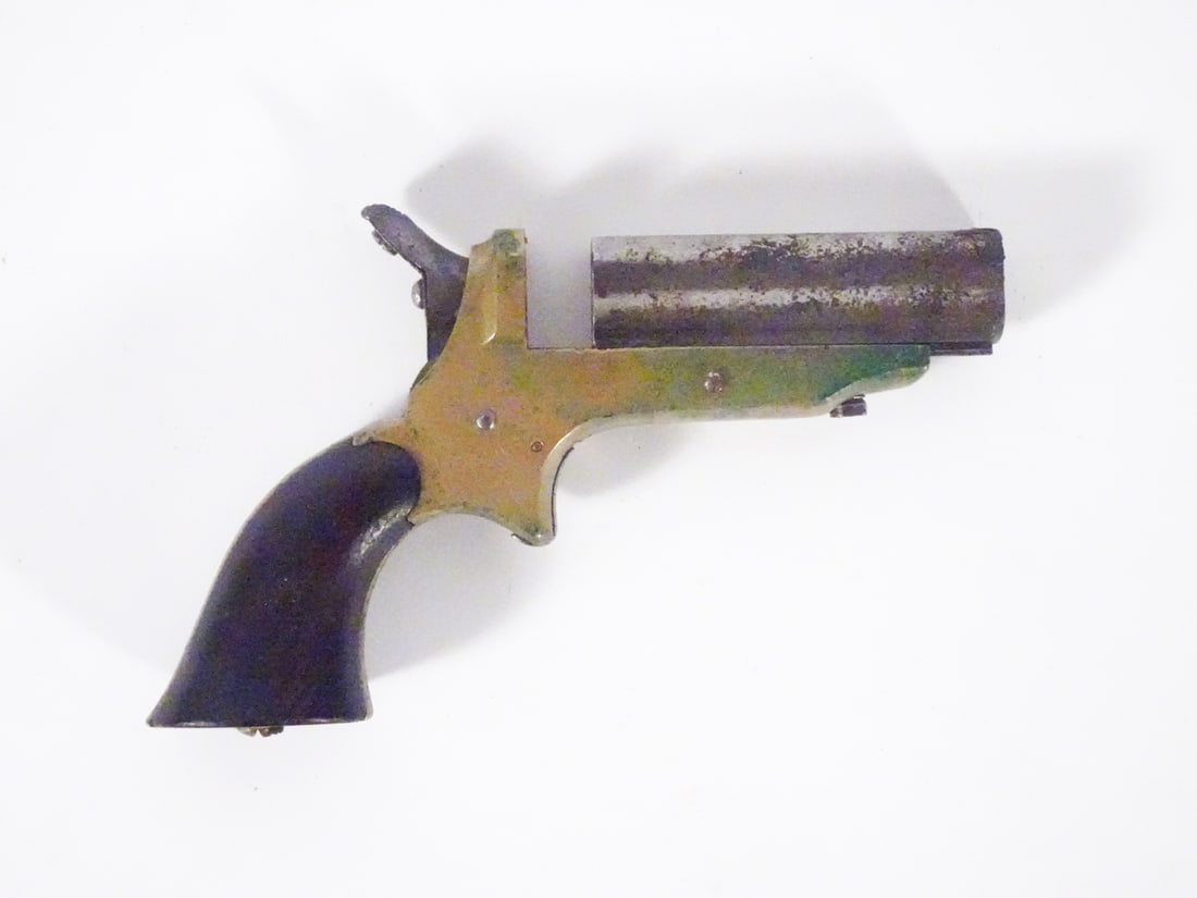 C. Sharps & Co four barrel pepperbox pistol: C. Sharps & Co 4 barrel pepperbox pistol. 22 caliber, 4 rounds, top break with rotating hammer. Serial number 1547. 2 5/8" barrel, length overall 4 3/4". Patent date 1859. C&R - YES / Instacheck - NO.
