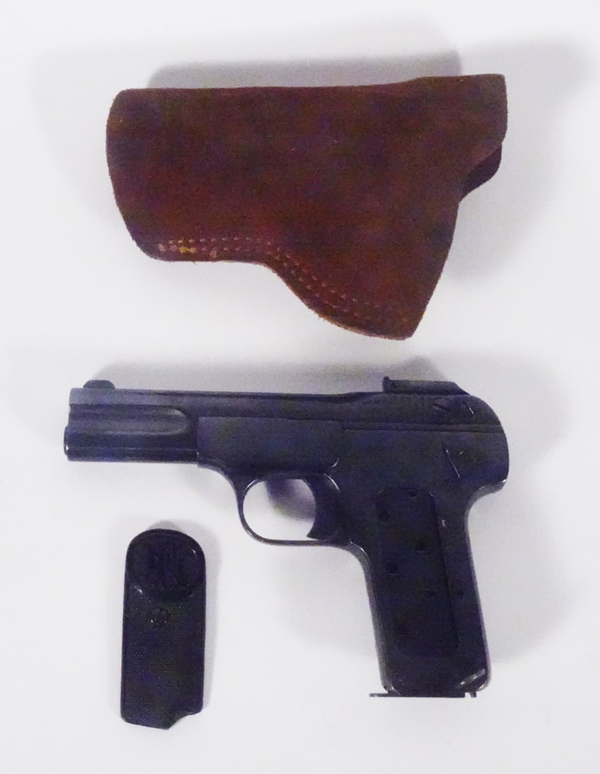 Fabrique Nationale KPPK No.64 semi-automatic pistol: Fabrique Nationale model KPPK No.64 semi-automatic pistol. 32 caliber, 8 round magazine fed. Serial number 218751. 4" barrel. overall length 6 1/2". Includes 1 magazine and Gunskin belt clip-on soft h