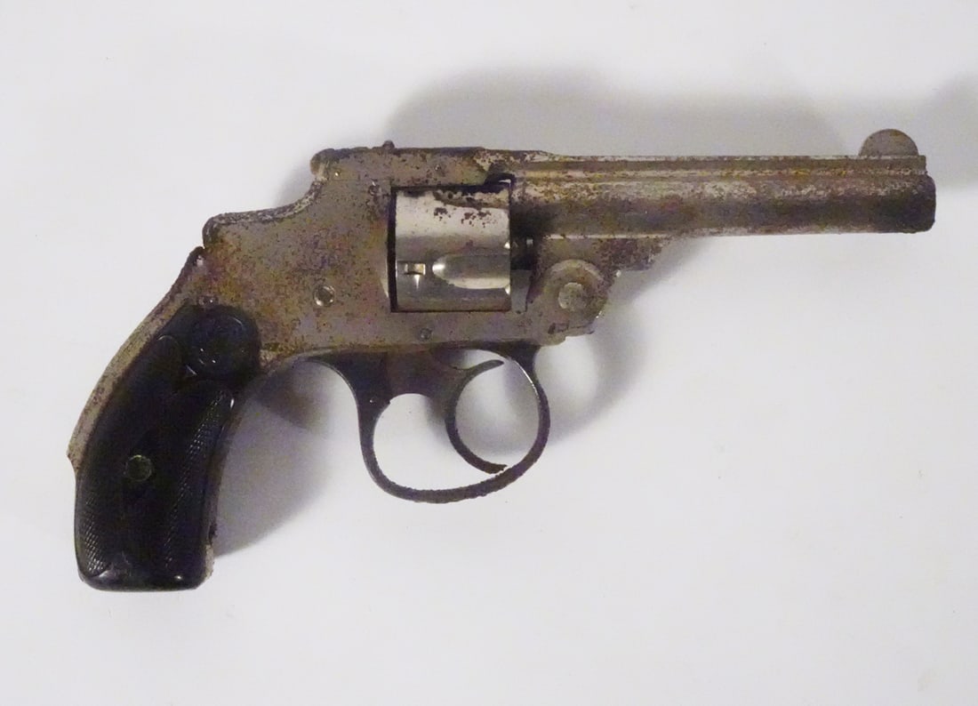 Smith & Wesson revolver: Smith & Wesson double action revolver. 32 caliber, 5 round cylinder. Serial number 30858. 3 1/2" barrel. Overall length 7".