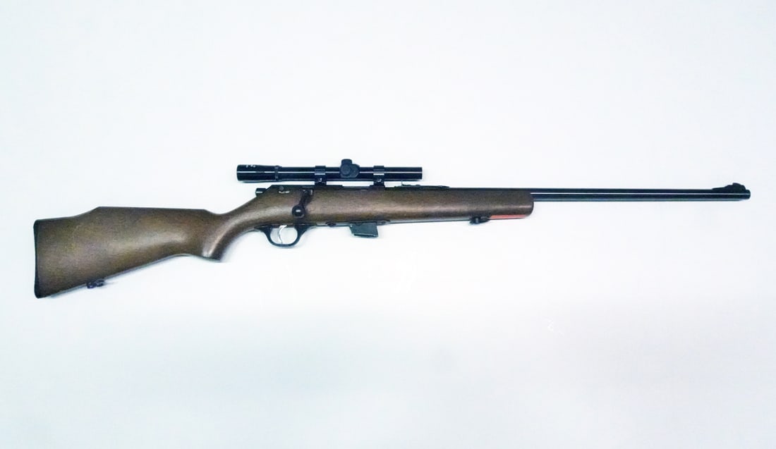 Marlin Firearms Company Glenfield Model 25 bolt action rifle: Marlin Firearms Company Glenfield Model 25 bolt action rifle. 22 SHORT / LONG or LONG RIFLE. 21 round tube fed. Serial number 21584852. 22" barrel. Length overall 41 1/4". Includes mounted Glenfield 4
