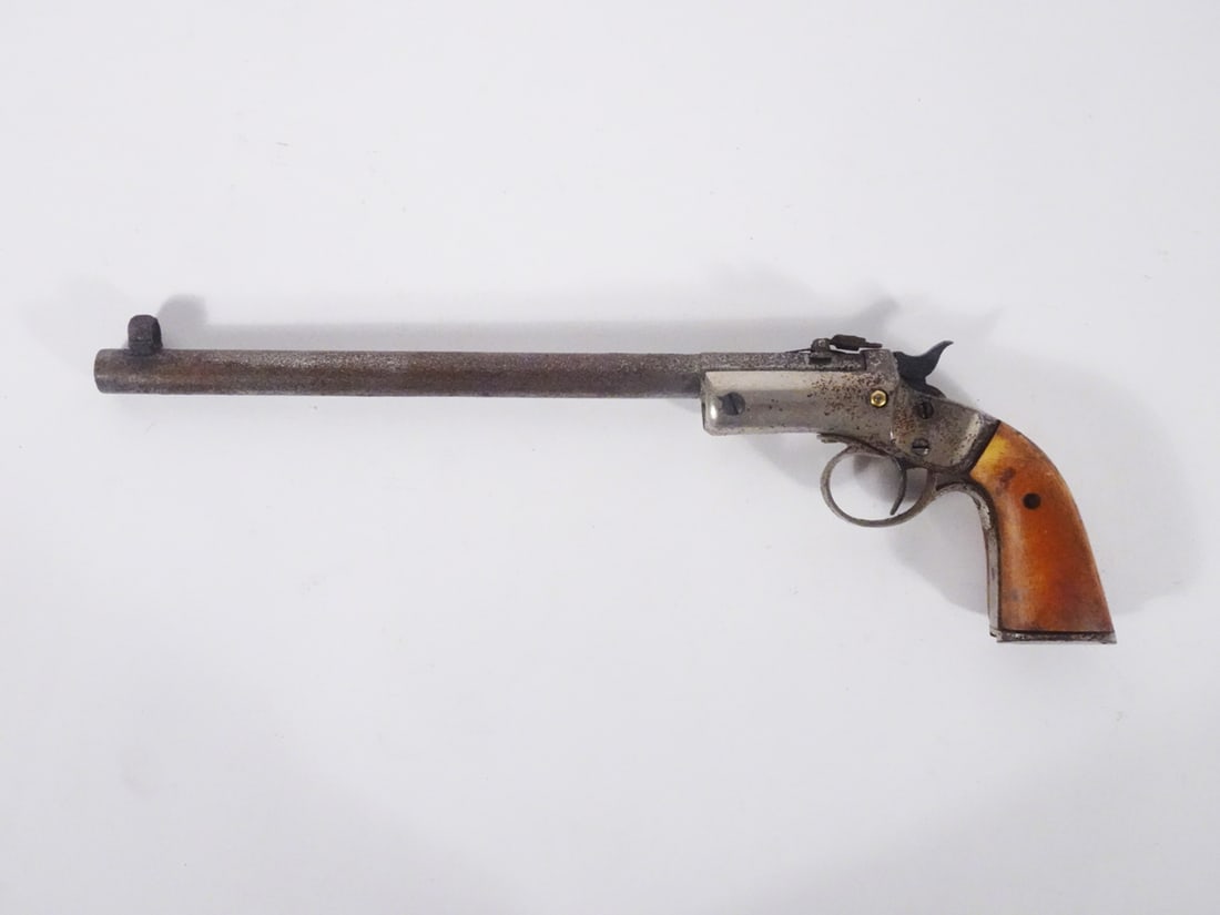 Hawes Firearms Favorite Target Pistol: Hawes Firearms Company model Favorite Target Pistol single action pistol. 22 caliber. Single shot. Serial number 10669. 10" barrel. Overall length 13 1/2". Estimated manufacture in 1960's via "Gun of