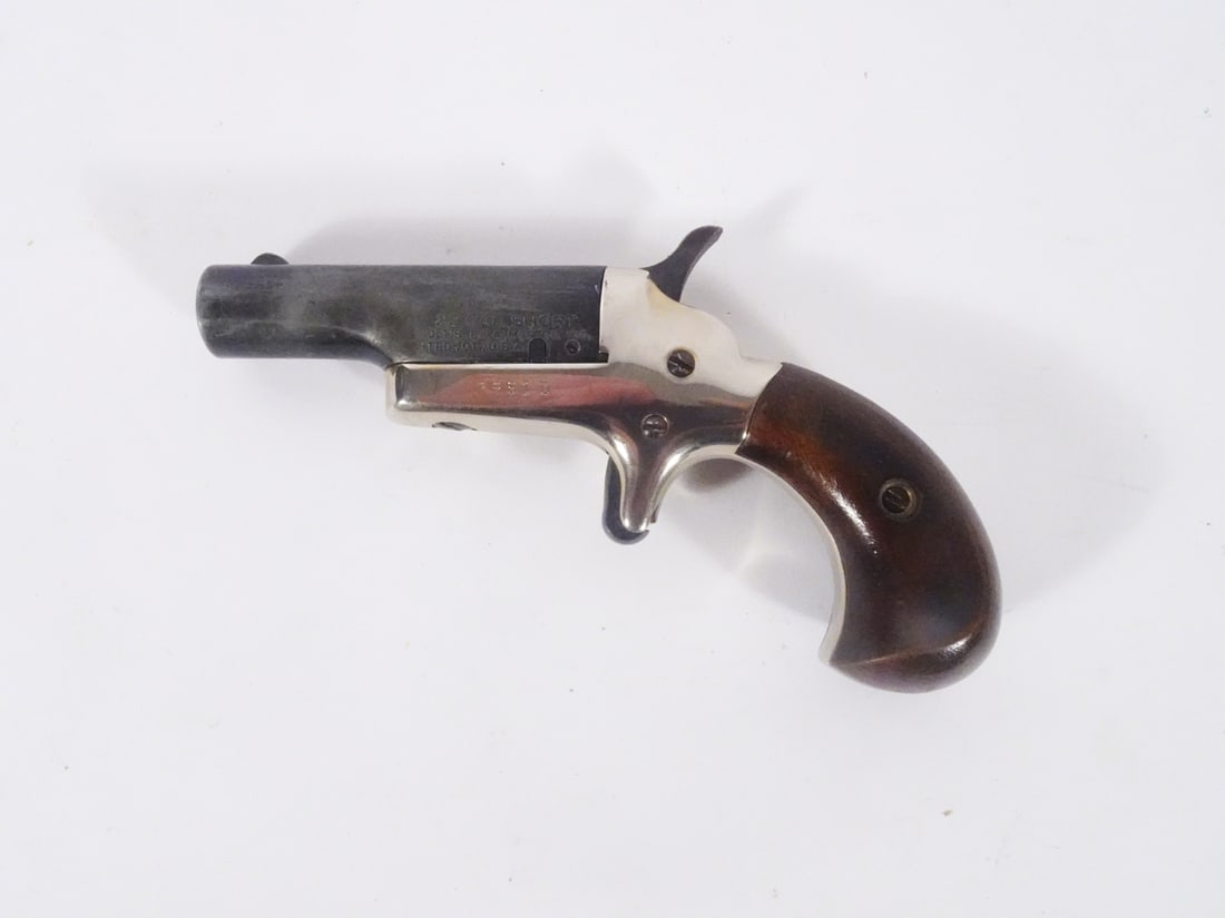 Colt 4th Model derringer: Colt 4th Model top-break derringer. 22 SHORT, single shot. Serial number 28071D. 2 1/2" barrel. Overall length 5". C&R - YES / Instacheck - YES.