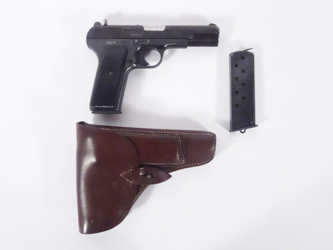 Zastava M57 semi-automatic pistol: Zastava model M57 semi-automatic pistol. 7.62mm Tokarev. 9 round magazine fed. Serial number D-172210. 4 7/8" barrel. Overall length 7 1/2". Serial numbers on barrel, slide and frame match. Includes o