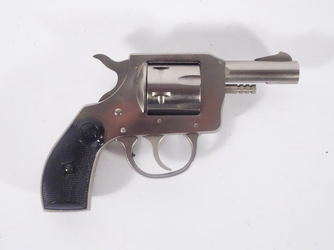 Harrington & Richardson 733 revolver: Harrington & Richardson model 733 double action revolver. 32 Smith & Wesson. 6 round cylinder fed. Serial number AS50773. 2 n1/2" barrel. Overall length 6 1/2". C&R - NO / Instacheck - YES.