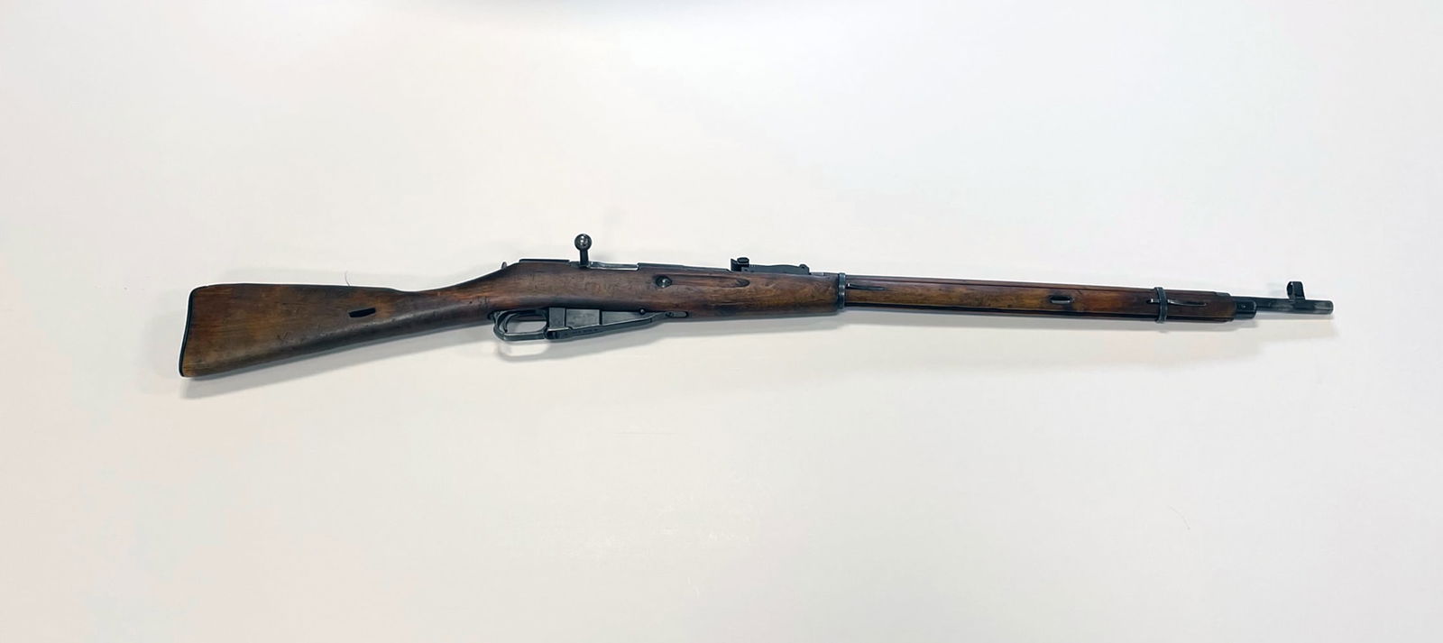 Mosin Nagant bolt action rifle: Mosin Nagant bolt action rifle. Serial number 127050 (on receiver). 7.62X54 mm Russian. 5 round fed from internal magazine. 29" barrel. Overall length 48 1/2". C&R - YES / Instacheck - YES.