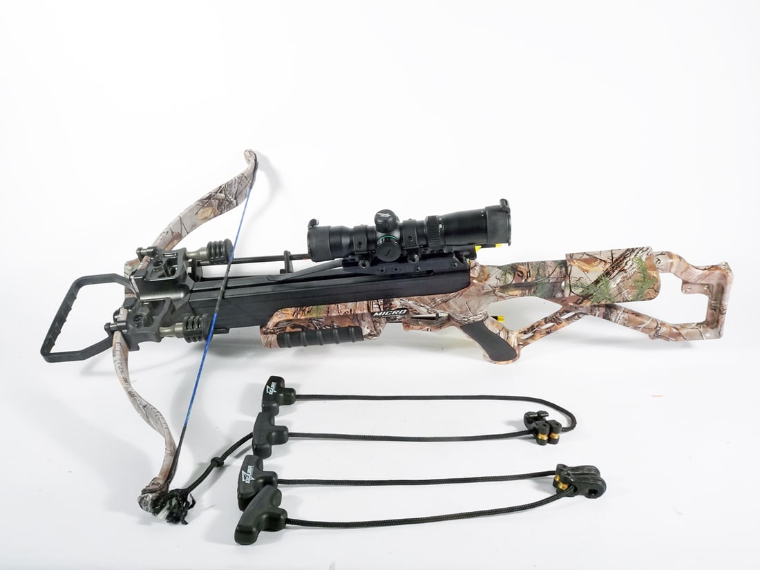 Excalibur Micro crossbow: Excalibur Micro crossbow package. Includes Tact Zone scope and 4 rods. 33 3/4" long X 25" wide X 10" high.
