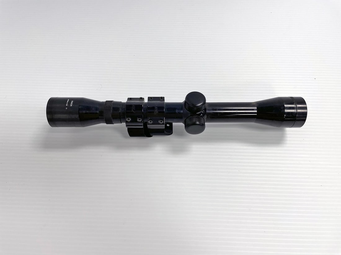 Tasco 663A scope: Tasco 663A scope. 4 X32. Kwik-Site mounts attached. 12" length / 3" diameter.