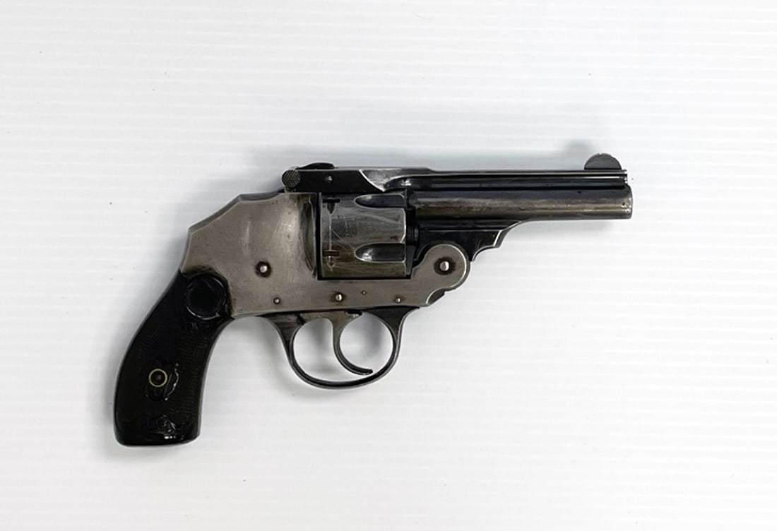 Iver Johnson top-break revolver: Iver Johnson to-break revolver. 5 round cylinder. Serial number 49881. 3 1/4" barrel. Length overall 7 1/2". Has original pistol grips. C&R - NO / Instacheck - YES.
