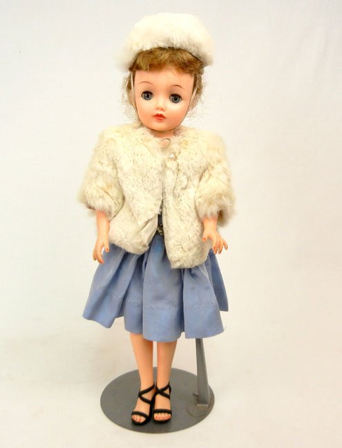 "Miss Revlon" by Ideal, 18", vinyl socket head, join: "Miss Revlon" by Ideal, 18", vinyl socket head, jointed adult shaped hard plastic body, blue sleep eyes, painted and applied lashes, red lips, blue dress, butterfly pin, fur jacket and hat, black heel