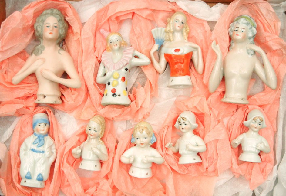 Group of nine pin cushion dolls, six marked Germany: Group of nine pin cushion dolls, six marked Germany, one marked Japan, two unmarked, tallest size 4"