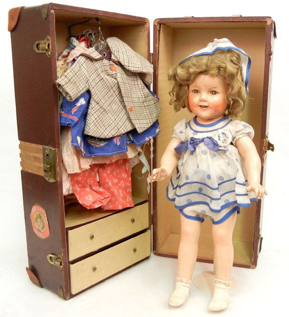All original Ideal Shirley Temple doll with origina: All original Ideal Shirley Temple doll with original Shirley Temple trunk and wardrobe, composition jointed five piece body, sleep eyes, open mouth with teeth, applied and painted lashes, wearing tagg