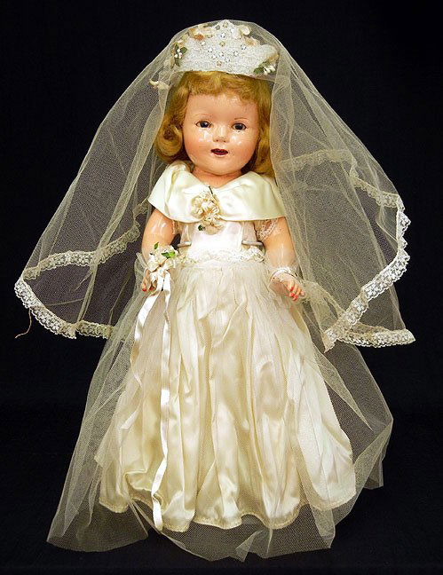 Ideal Shirley Temple composition doll, sleep eyes,: Ideal Shirley Temple composition doll, sleep eyes, painted and applied lashes, open mouth with teeth, new wig, new clothes, face has been touched up, marked on back of head "Shirley Temple, copyright