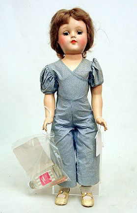 Ideal P-93 Toni doll, hard plastic, blue sleep eyes: Ideal P-93 Toni doll, hard plastic, blue sleep eyes, painted and applied lashes, closed mouth, wearing outfit, socks, and shoes, with Doll Bobby Pins and Toni Play Wave lotion bottle, larger size 21",