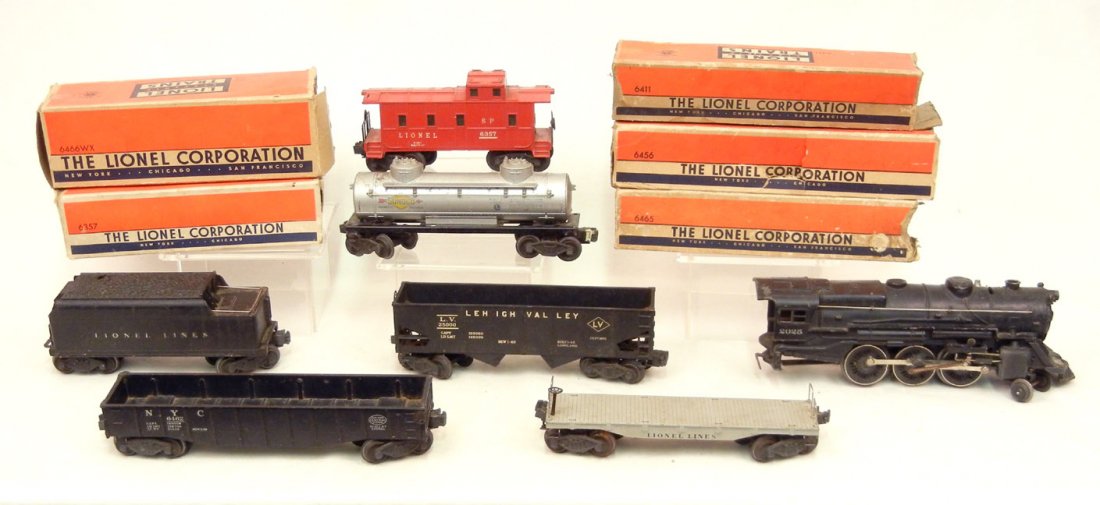 Lionel Freight cars, "O" Gauge, including No. 2025: Lionel Freight cars, "O" Gauge, including No. 2025 Steam locomotive and No. 6466 WX tender, No. 6411 Flat car, No. 6456 Hopper car, No. 6465 Tank car, and No. 6462 Gondola (no box)