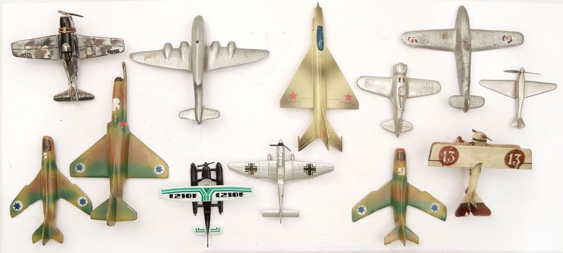 Grouping of twelve 1930s and up diecast, slush cas: Grouping of twelve 1930s and up diecast, slush cast, rubber, and ceramic aircraft models, including a Limoges pill box, Matchbox, Playme, and more