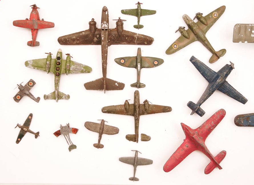 Twenty-one die cast and slush cast aircraft toys,: Twenty-one die cast and slush cast aircraft toys, including Crescent, France, Made in England, Timpo Toys, Mohill, and more