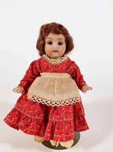 German all bisque 7" doll: German all bisque 7" doll, brown mohair wig, blue sleep eyes with painted browns and lashes, open mouth with teeth, five piece jointed all bisque, painted socks and shoes, wearing red dress with