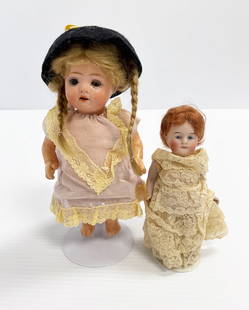 Two antique German bisque dolls: Two antique German bisque dolls; one 8" bisque head baby marked 121, Recknagel, compo body and an all bisque 5" painted eye doll marked 124.3