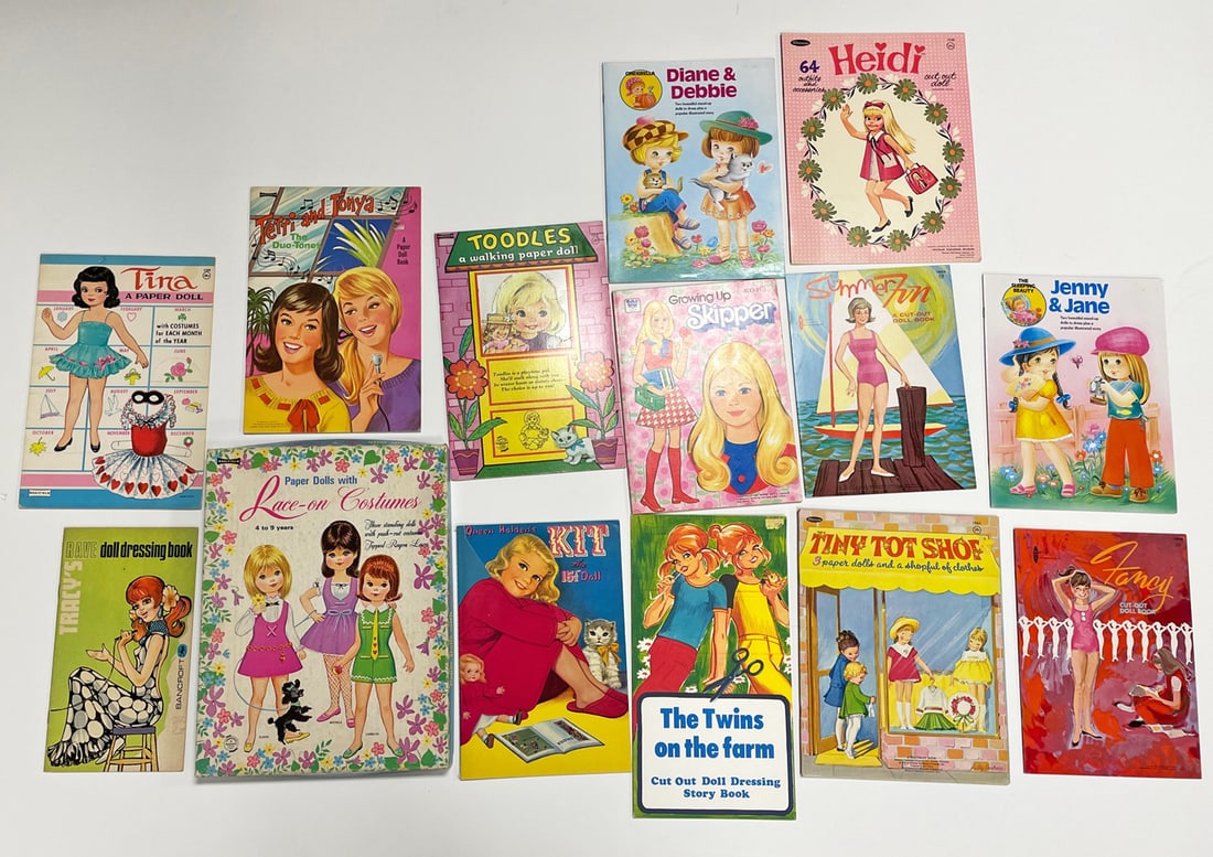 Fourteen vintage paper doll books (1 of 2)