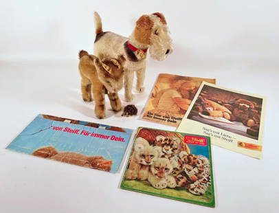 Three Steiff animals and vintage Steiff brochures: Three Steiff animals and vintage Steiff brochures, Zicky goat 9" high with original neck ribbon and bell, chest tag and ear button; Foxy Airdale dog 11" high with collar, chest tag, ear button and ear