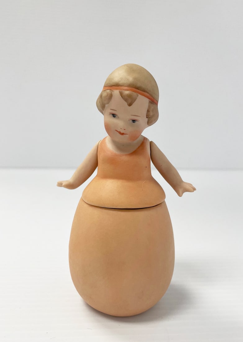 Heubach style porcelain dresser jar: Heubach style porcelain dresser jar, 5", hinged arms, artist signed on bottom C. May 2000