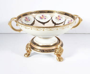 Nippon Porcelain Bowl on Stand: Nippon Japanese porcelain bowl on stand, decorated with hand painted floral designs and gold beading, circa early 20th c., bowl is signed on underside of base "Hand Painted Nippon" with M in wreath,