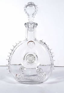 Baccarat Glass Remy Martin Cognac Decanter: Baccarat French crystal glass Remy Martin Louis XIII Cognac decanter, decorated with relief Fleur de Lis and raised glass designs, circa early 20th c. to mid 20th c., signed on underside "E. REMY